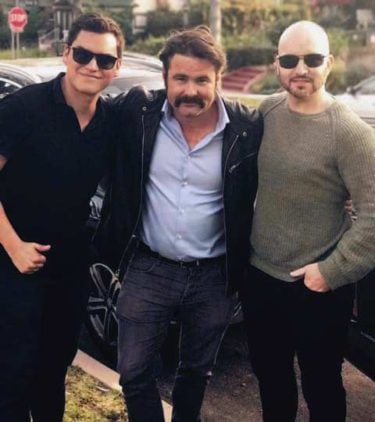 Film Connection student Juan Armijos, actor Mickey Gooch Jr. and mentor filmmaker Rob Weston on the set of Madness in the Method