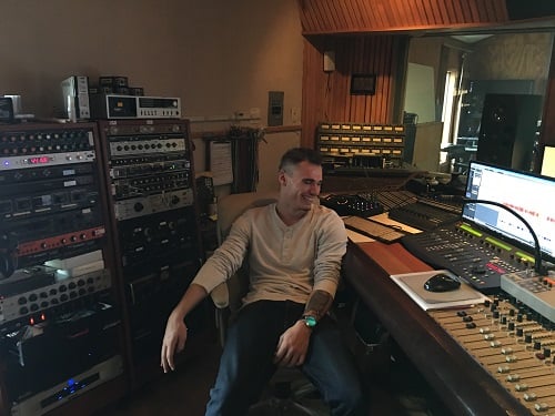 Recording Connection grad Zack Slippy at recording studio The Loft